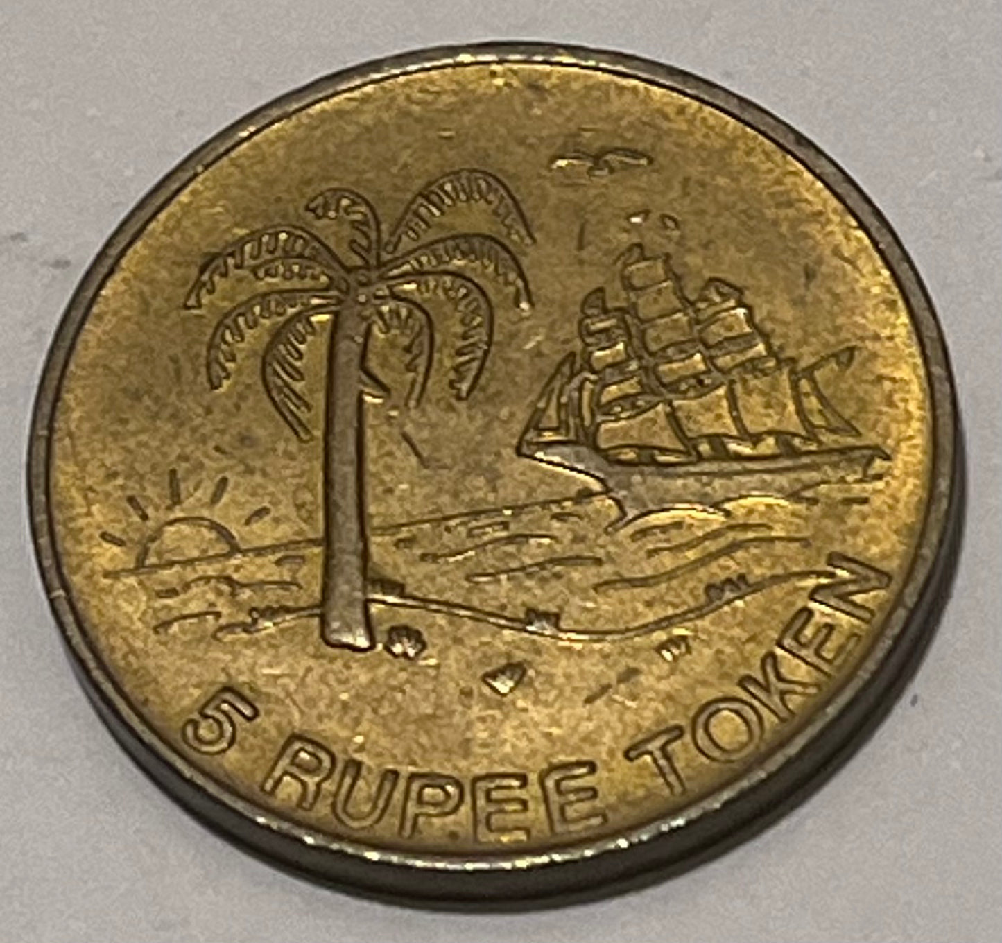 MAURITIUS, ND ~ 5 Rupee token AE26 ~ Sun International ~ Palm tree, sail boat ~ TC-253250 (2R), TC-180809 (10R), 5 Rupee unlisted