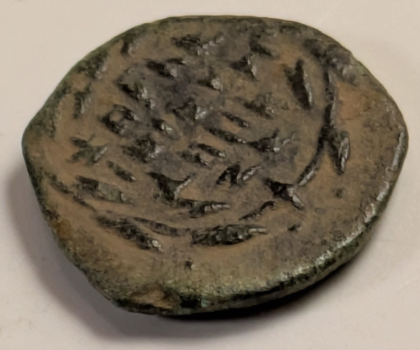 JUDAEA, John Hyrvanus ~ 135-104 BC ~ AE Prutah (1.58g) ~ Paleo-Hebrew in wedge style characters, "Yehohanan the High Priest & the Council of the Jews" ~ Double cornucopia, pomegranate between horns, monograph to lower right (Γ) ? ~ Hen-1135, TJC-D ~ VF