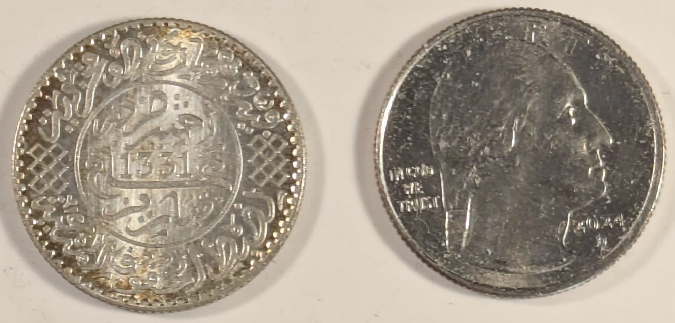 MOROCCO, Yusuf ~ 1331 Paris (1912) ~ 2 1/2 Dirhams (1/4 Rial) ~ One year type in very high grade ~ Y-31, Lec-155 ~ Choice BU