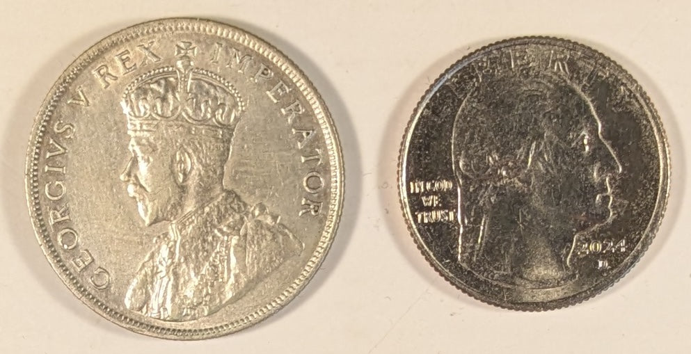 SOUTH AFRICA, Union of So. Africa, Dominion ~ 1927 ~ 1 Florin ~ Crowned bust of George V left ~ Arms divides date. Denomination as FLORIN. ~ Y-20, KM-18 ~ VF/EF