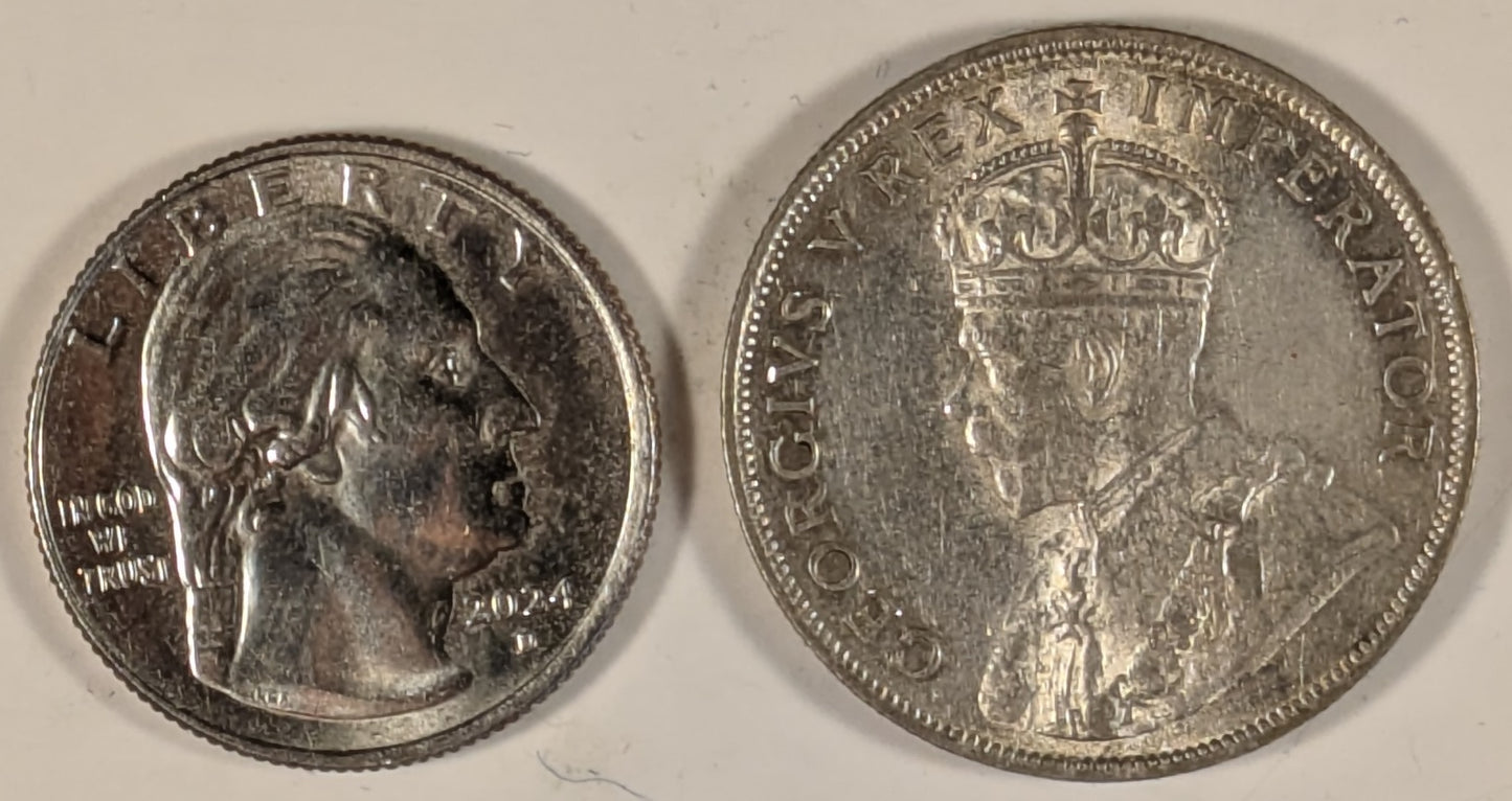 SOUTH AFRICA, Union of So. Africa, Dominion ~ 1928 ~ 1 Florin ~ Crowned bust of George V left ~ Arms divides date. Denomination as FLORIN. ~ Y-20, KM-18 ~ EF