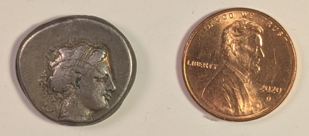 CAMPANIA, Neapolis ~ 325-241 BC ~ Silver Didrachm (7.41) ~ Head of nymph right. behind in Artemis-Hekate (head off-flan) ~ Man-headed bull right, being crowned by Nike, small monogram below ~ SG-308, SNG Cop-419 ~ Fine+, but a bit o.c., curved obv. s