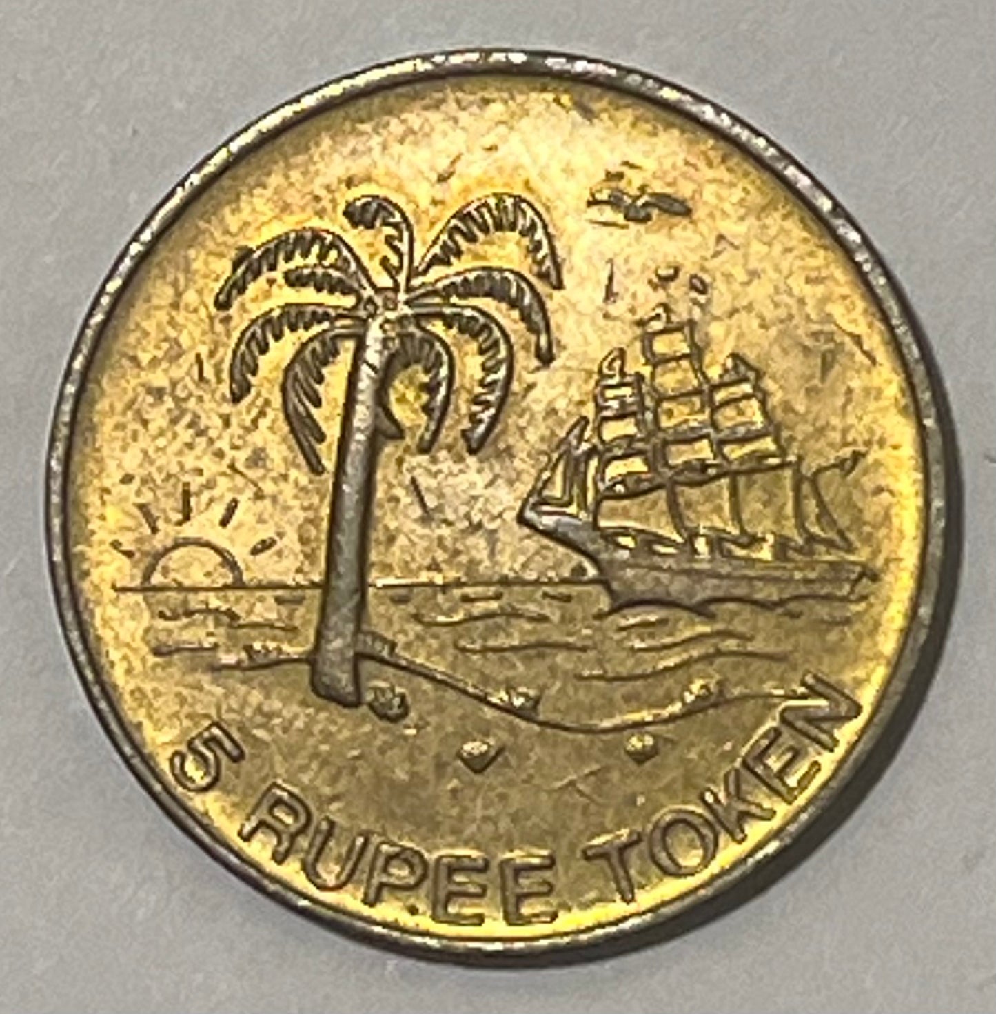 MAURITIUS, ND ~ 5 Rupee token AE26 ~ Sun International ~ Palm tree, sail boat ~ TC-253250 (2R), TC-180809 (10R), 5 Rupee unlisted