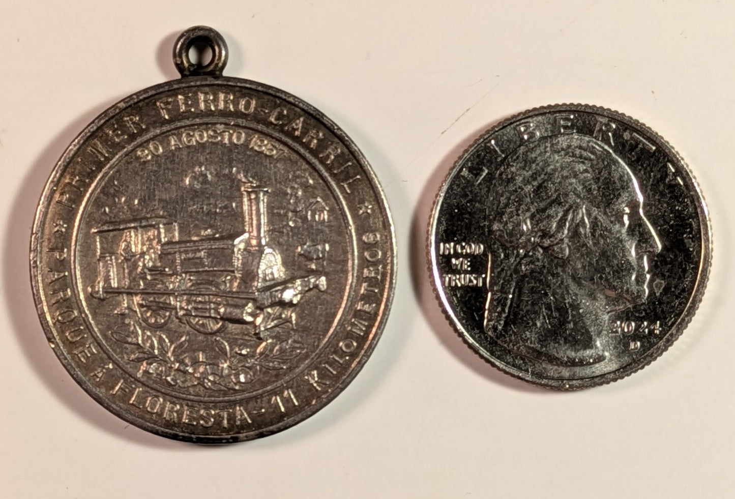 ARGENTINA, 50th anniversary 1st railroad Parque to Floresta, 1907 ~ Silvered AE31mm, looped as made ~ Steam engine in center, legend around ~ Allegorical figures, train in background, legend around ~ As Swan-539 ~ EF