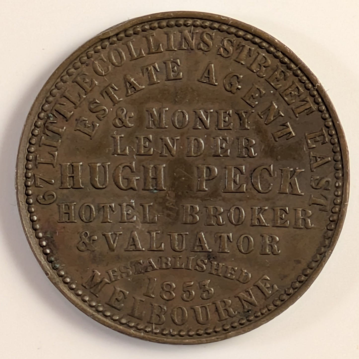 AUSTRALIA, Melbourne, Hugh Peck ~ ND ~ Penny Token ~ Long legends both sides ~ The rarer of two varieties ~ Ren-423, A-433, KM-Tn109 ~ VF, but small dent in center of obverse