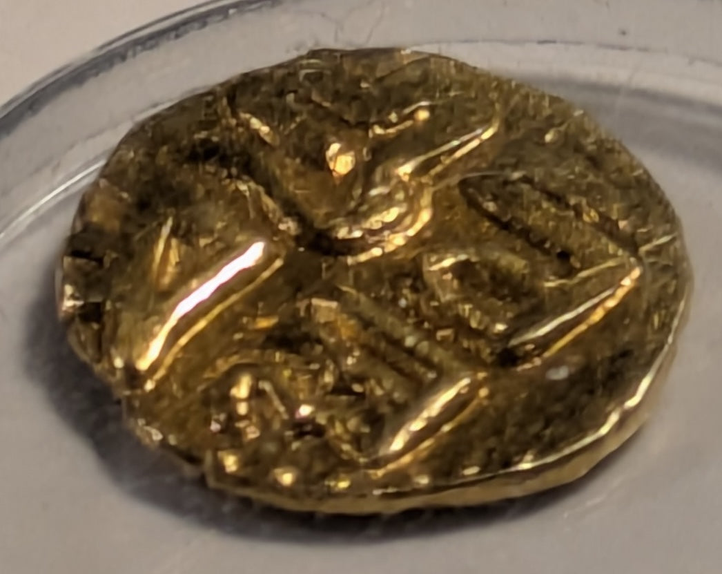 INDIA, Cholas of Tanjore. Raja Raja ~ 985-1014 ~ Gold Fanam (.44g) or 1/8 Kahavanu ~ Tiger seated right, bow behind, facing two upright fishes ~ 2 line legend, “Yuddha Malla”. Scarce ~ MNIS-726, Fr-286 ~ VF