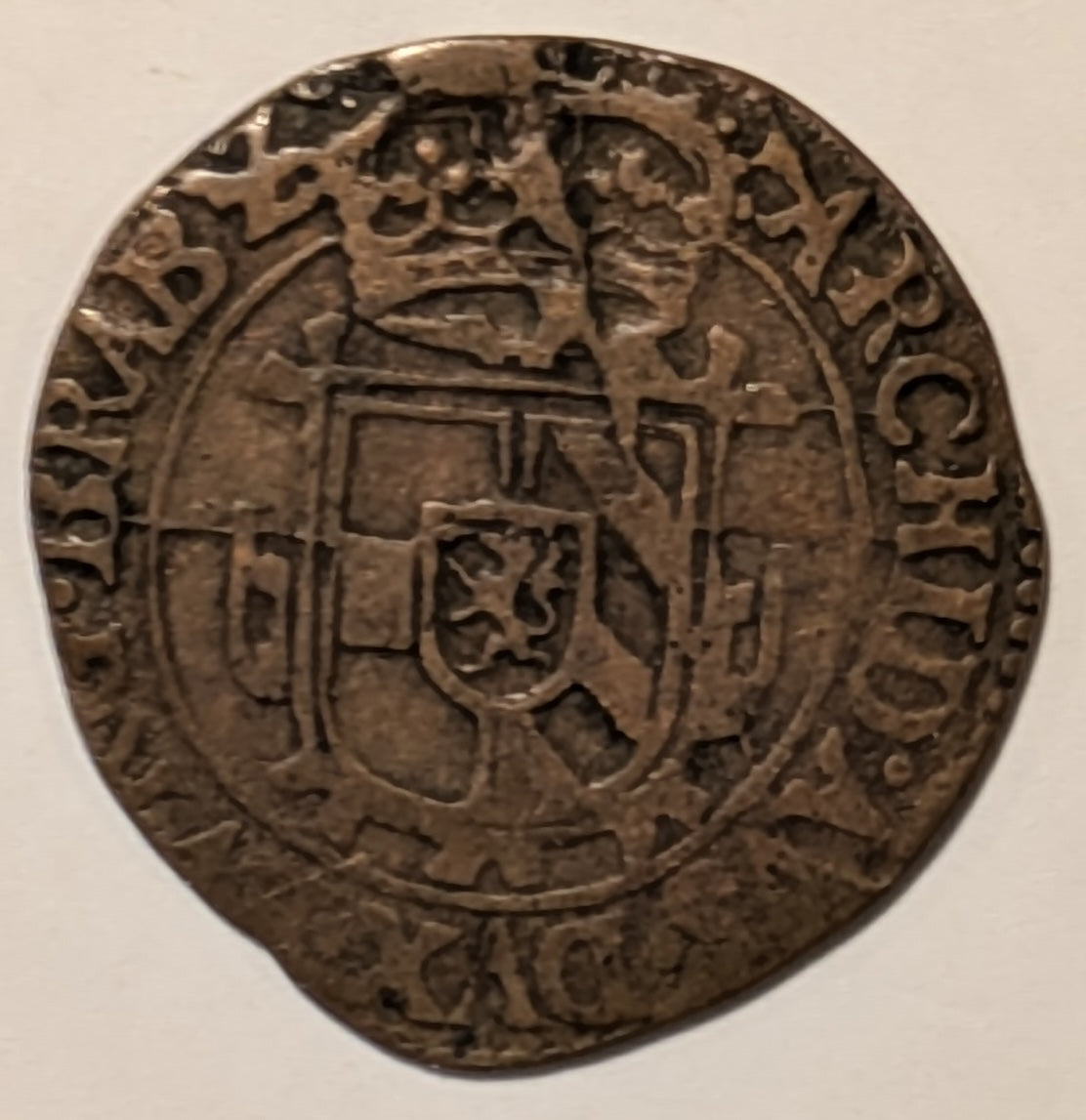SPANISH NETHERLANDS, Philip IV ~ 1650 ~ AE Gigot (1.68g) ~ St. Andrew's cross, crown above, fleece below, "angel's face" above & legend ~ Crowned shield of Philip IV ~ Brussels mint ~ KM-55.3, GH-338.3 ~ Nice Fine