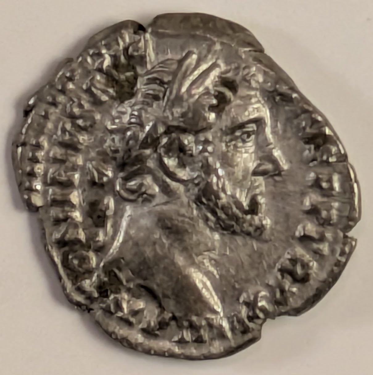 ROME, Antoninus Pius ~ 138-161 AD (154) ~ Silver Denarius (3.16g) ~ Laureate bust right ~ Annona holding two corn-ears with right hand and resting left hand on modius, set on prow ~ RIC-221, RSC-290 ~ Ch VF/VF on a small flan