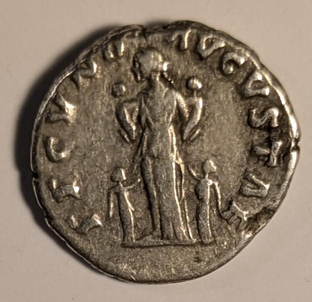 ROME, Faustina Jr., wife of Marcus Aurelius ~ Died 175-176 AD ~ Silver Denarius (3.15g) ~ Draped bust rt FAVSTINA AVGVSTA ~ Fecunditas standing between 2 children, holding 2 more in arms FECVND AVGVSTAE ~ RIC-676, RSC-95, SR-5251 ~ Fine+, Popular type