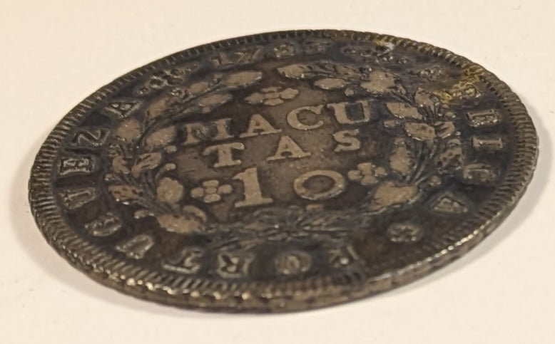 ANGOLA, Portuguese Africa ~ 1783 ~ 10 Macutas ~ Crowned arms ~ Denomination within wreath. One year type issued under Maria I and Pedro III ~ Cr-22, KM-24, Dav-6 ~ Toned VF