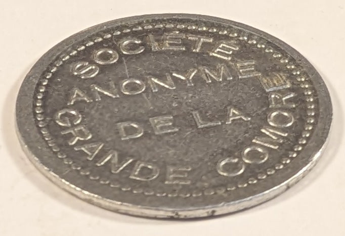 COMOROS, SOCIETE ANONYME DE LA  ~ GRANDE COMORE ND (1915) ~ 25 Centimes Aluminum token ~ SOCIETE ANONYME DE LA GRANDE COMORE ~ BON DE REMBOURSABLE 25¢ ~ Lec-21, Gad-4, KN-Tn-1 ~ EF, some porosity
