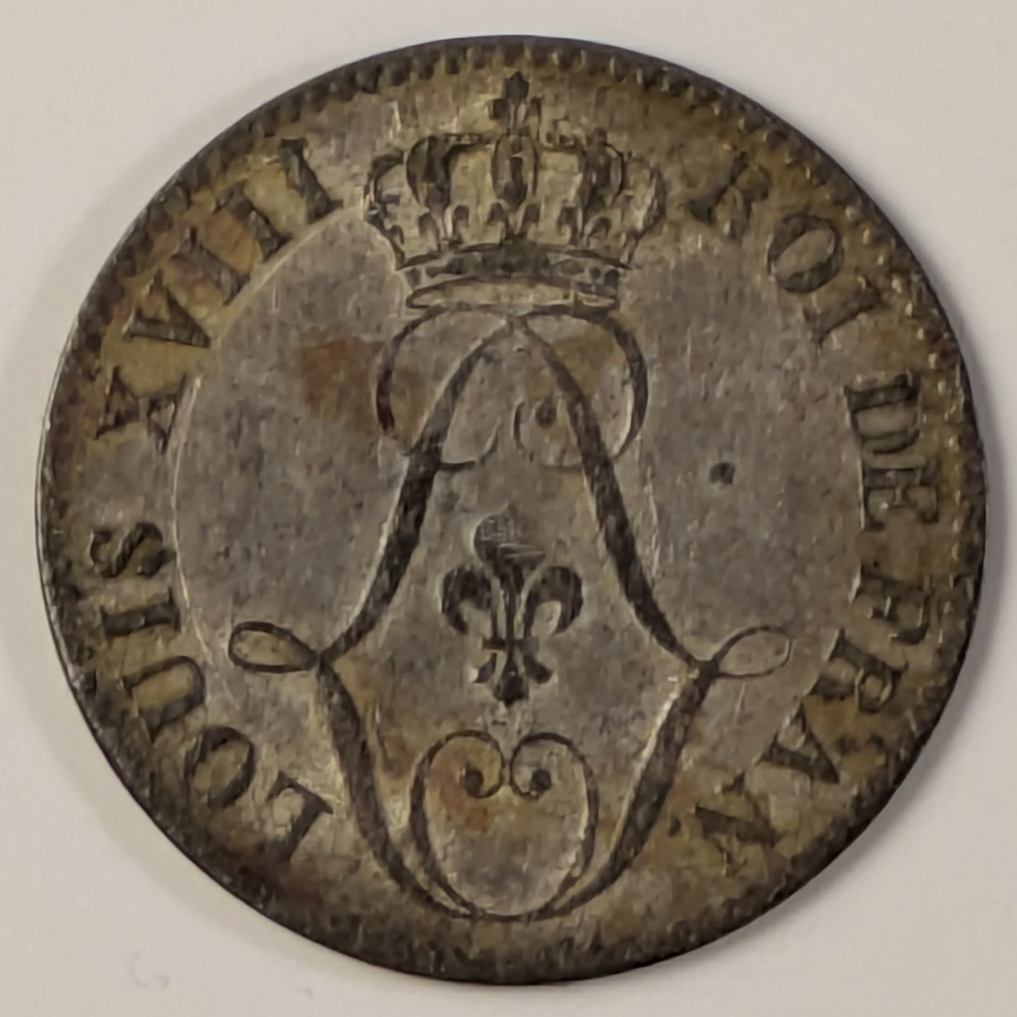 FRENCH GUIANA, Colony of Cayenne ~ 1818-A ~ 10 Centimes ~ 1 year billion type ~ Crowned monogram of Luis XVIII. High grade for this issue ~ KM-1a, CR-4, Lec-30 ~ Lustrous EF for type