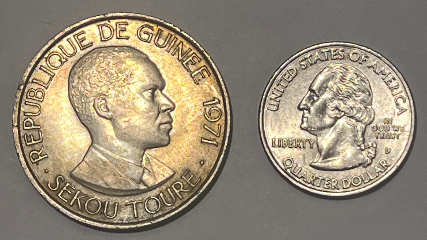 GUINEA, Republic ~ 1971 ~ 100 Francs ~ One year type. Head of Ahmed Sekou Toure ~ Not released for circulation. Scarce ~ Y-9, KM-41 ~ Toned Unc