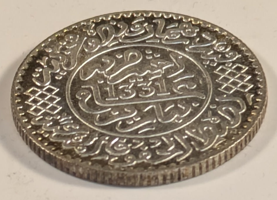 MOROCCO, Yusuf ~ 1331 Paris (1912) ~ 2 1/2 Dirhams (1/4 Rial) ~ One year type in very high grade ~ Y-31, Lec-155 ~ Choice BU