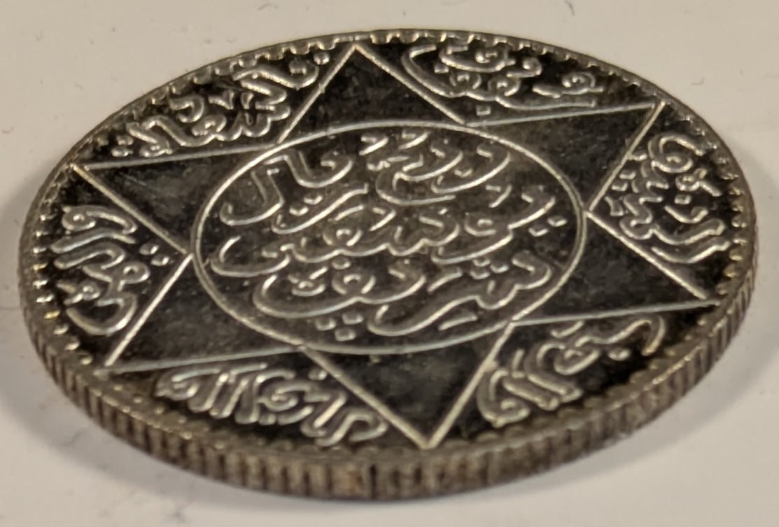 MOROCCO, Yusuf ~ 1331 Paris (1912) ~ 2 1/2 Dirhams (1/4 Rial) ~ One year type in very high grade ~ Y-31, Lec-155 ~ Choice BU