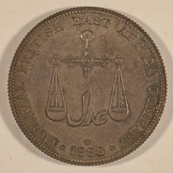 MOMBASA, British Colony ~ 1888-H ~ 1 Rupee ~ Scales above mint mark and date ~ Crown above radiant sun. Struck at Heaton Mint in Birmingham, England ~ Y-5, KM-5 ~ Ch. toned Proof or Specimen