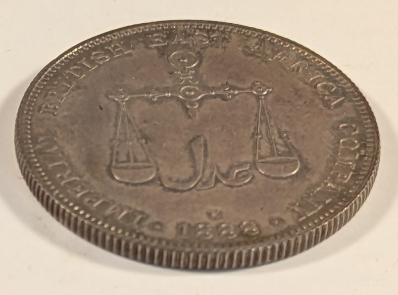 MOMBASA, British Colony ~ 1888-H ~ 1 Rupee ~ Scales above mint mark and date ~ Crown above radiant sun. Struck at Heaton Mint in Birmingham, England ~ Y-5, KM-5 ~ Ch. toned Proof or Specimen