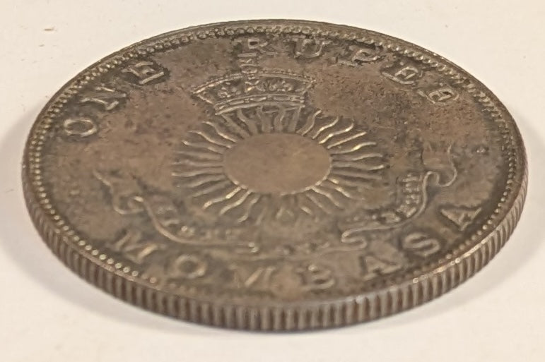 MOMBASA, British Colony ~ 1888-H ~ 1 Rupee ~ Scales above mint mark and date ~ Crown above radiant sun. Struck at Heaton Mint in Birmingham, England ~ Y-5, KM-5 ~ Ch. toned Proof or Specimen