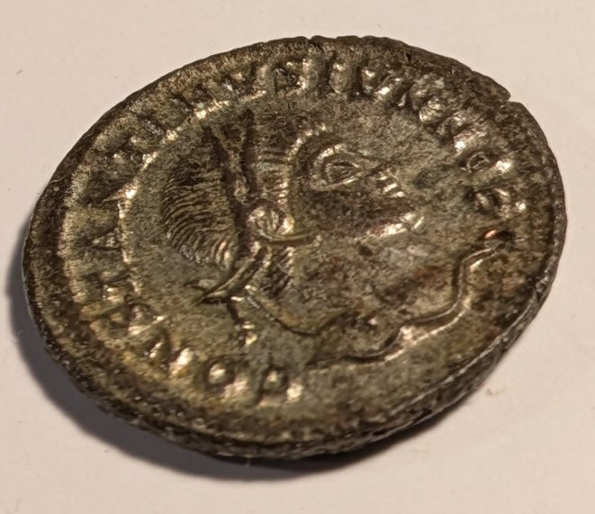 ROMAN EMPIRE, Constantine II 337-340. As Caesar ~ 317-337 (321-325) ~ Silvered Centenionalis (3.28g) ~ Laureate head rt. CONSTANTINVS IVN NOB C ~ CAESARVM NOSTRORVM, VOT X, ΓSIS & radiate sun below. Siscia mint ~ SR-17194, RIC-7, 182; Ch. toned EF