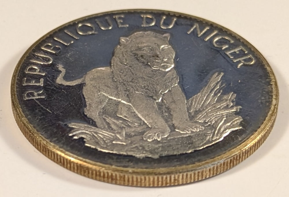 NIGER, Republic ~ 1968 ~ 10 Francs ~ Facing lion. Type 1 ~ Arms. Original strike with very sharp details, c. 20 grams ~ KM-8.1, Dav-521 ~ Gem toned Proof