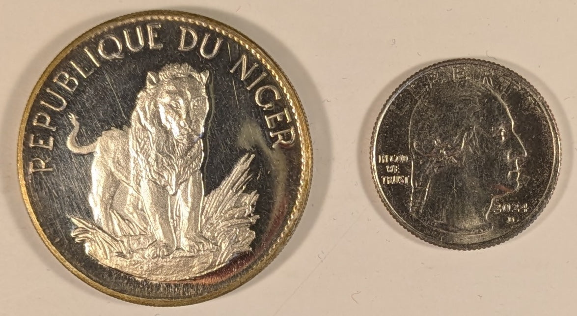 NIGER, Republic ~ 1968 ~ 10 Francs ~ Facing lion. Type 1 ~ Arms. Original strike with very sharp details, c. 20 grams ~ KM-8.1, Dav-521 ~ Gem toned Proof
