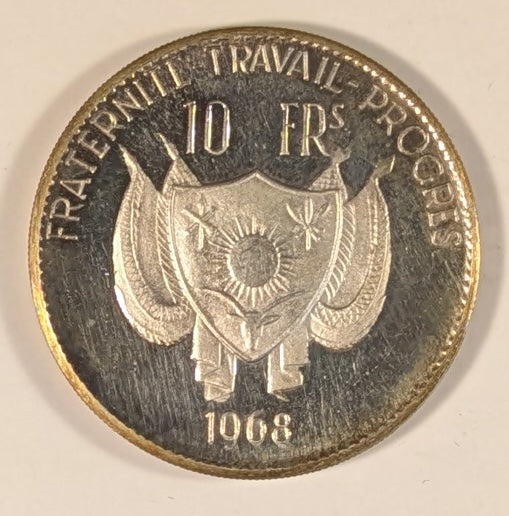 NIGER, Republic ~ 1968 ~ 10 Francs ~ Facing lion. Type 1 ~ Arms. Original strike with very sharp details, c. 20 grams ~ KM-8.1, Dav-521 ~ Gem toned Proof