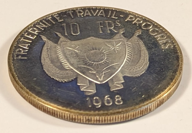 NIGER, Republic ~ 1968 ~ 10 Francs ~ Facing lion. Type 1 ~ Arms. Original strike with very sharp details, c. 20 grams ~ KM-8.1, Dav-521 ~ Gem toned Proof