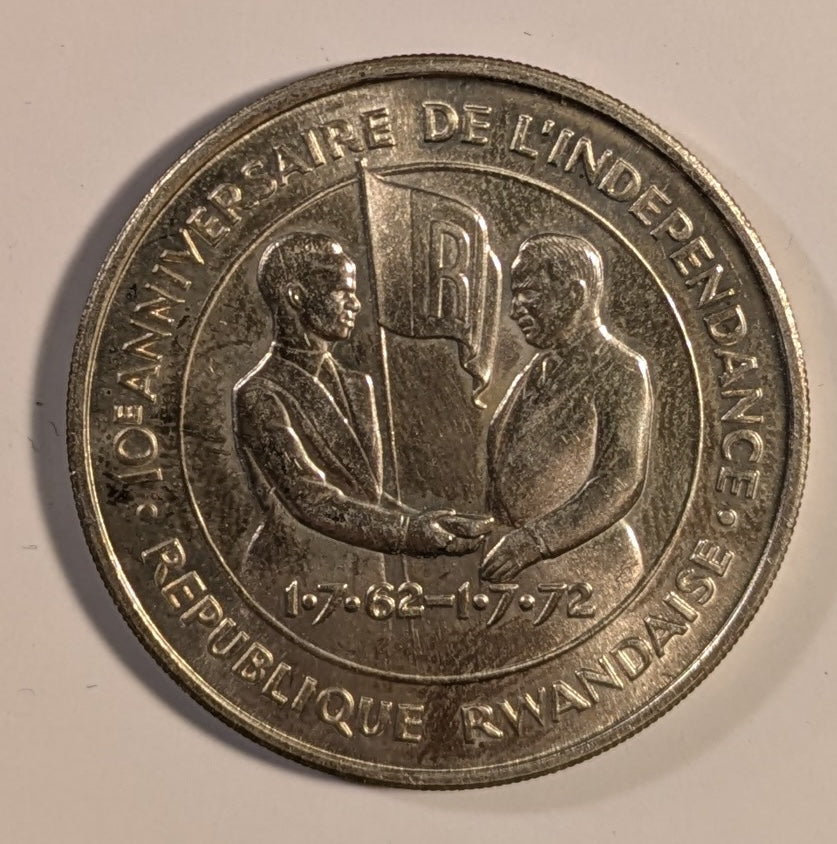 RWANDA, Republic ~ 1972 ~ Silver 200 Francs ~ 10th Anniverary of Independence. Gregoire Kayibanda, flag, dates ~ Figure picking coffee beans, FAO logo ~ Y-7, KM-11 ~ BU
