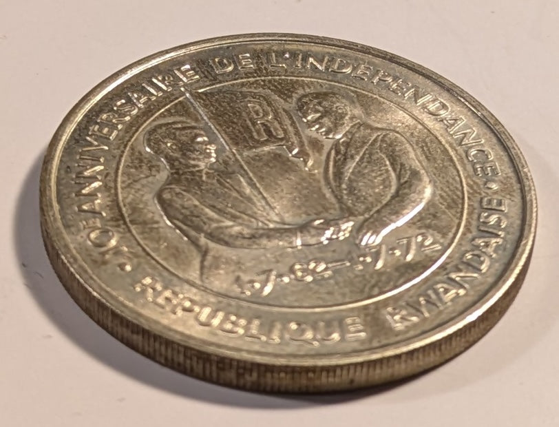 RWANDA, Republic ~ 1972 ~ Silver 200 Francs ~ 10th Anniverary of Independence. Gregoire Kayibanda, flag, dates ~ Figure picking coffee beans, FAO logo ~ Y-7, KM-11 ~ BU