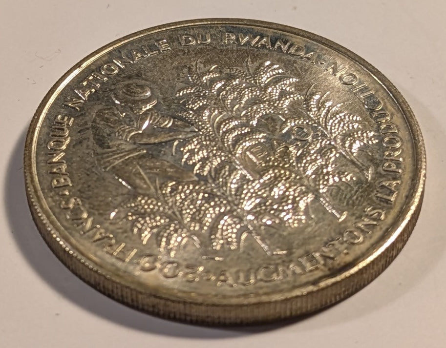 RWANDA, Republic ~ 1972 ~ Silver 200 Francs ~ 10th Anniverary of Independence. Gregoire Kayibanda, flag, dates ~ Figure picking coffee beans, FAO logo ~ Y-7, KM-11 ~ BU