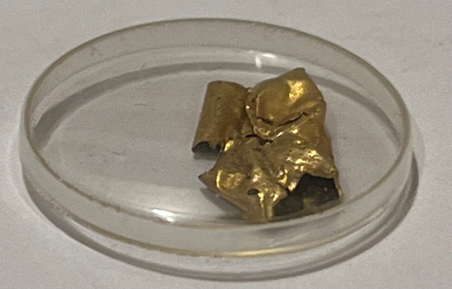 ROME, c. 200 BC - 200 AD ~ Gold Bulla or amulet (.11g of 18K) ~ c. 7 x 12 mm, very thin gold. Bulla are typically round seals or (Latin) "a bubble." ~ A knowleagable numismatist thought it was more likely an amulet.