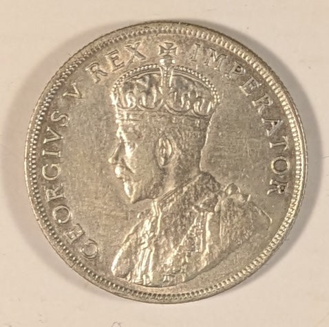 SOUTH AFRICA, Union of So. Africa, Dominion  ~ 1927 ~ 1 Florin ~ Crowned bust of George V left ~ Arms divides date. Denomination as FLORIN.  ~ Y-20, KM-18 ~ VF/EF