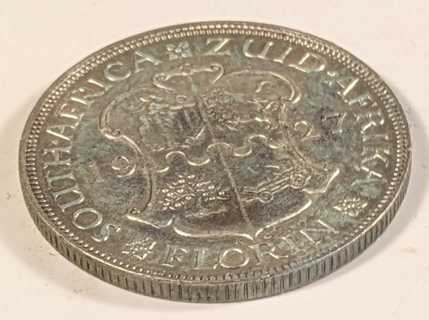 SOUTH AFRICA, Union of So. Africa, Dominion  ~ 1927 ~ 1 Florin ~ Crowned bust of George V left ~ Arms divides date. Denomination as FLORIN.  ~ Y-20, KM-18 ~ VF/EF