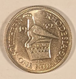 SOUTHERN RHODESIA, British Colony, George V ~ 1932 ~ Shilling ~ Bust of King left ~ Bird Headdress. 1st year of issue ~ Y-5, KM-3 ~ Choice BU, small spot behind head