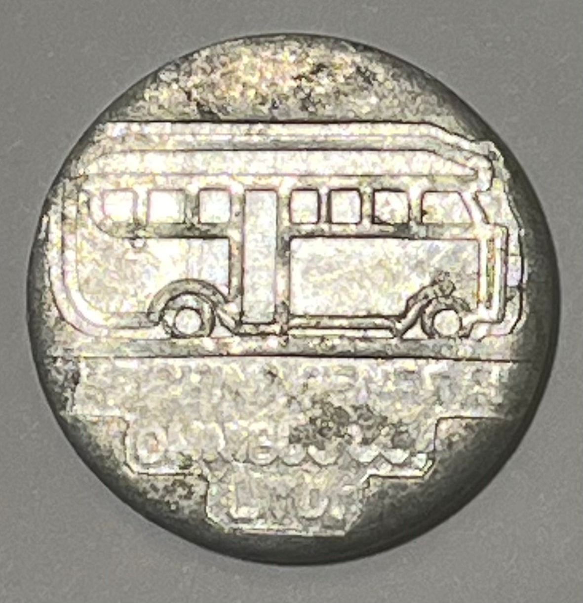 CHINA, Shanghai, Transportation Token ~ ND ~ Aluminum 25mm round ~ Bus to right "THE CHINA GENERAL OMNIBUS CO. LTD." in 3 lines ~ Large 3¢ in 3 circles ~ Smith-720G ~ EF