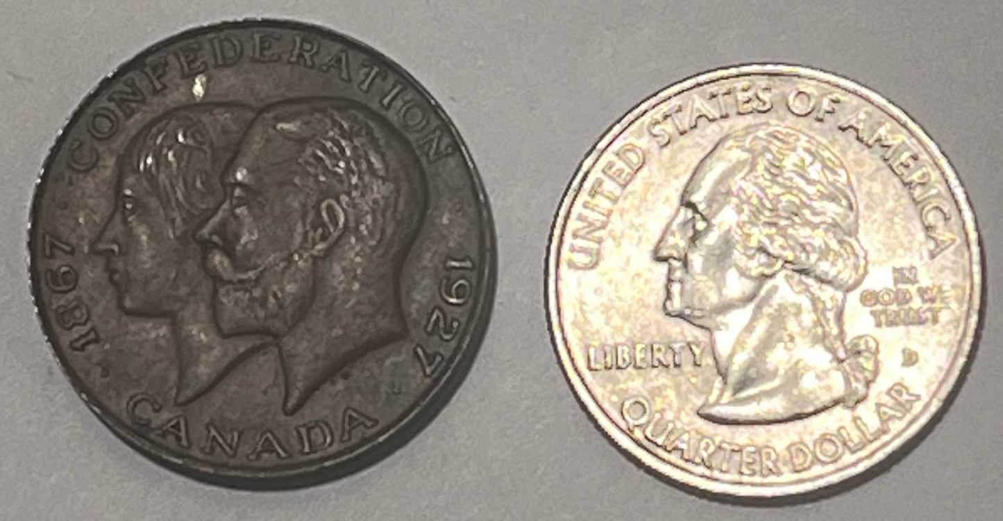 CANADA, 60th Anniversary of Confederation ~ 1927 ~ AE27 ~ Conjoined busts of George V and Mary left ~ Arms ~ TC-234773 ~ EF+