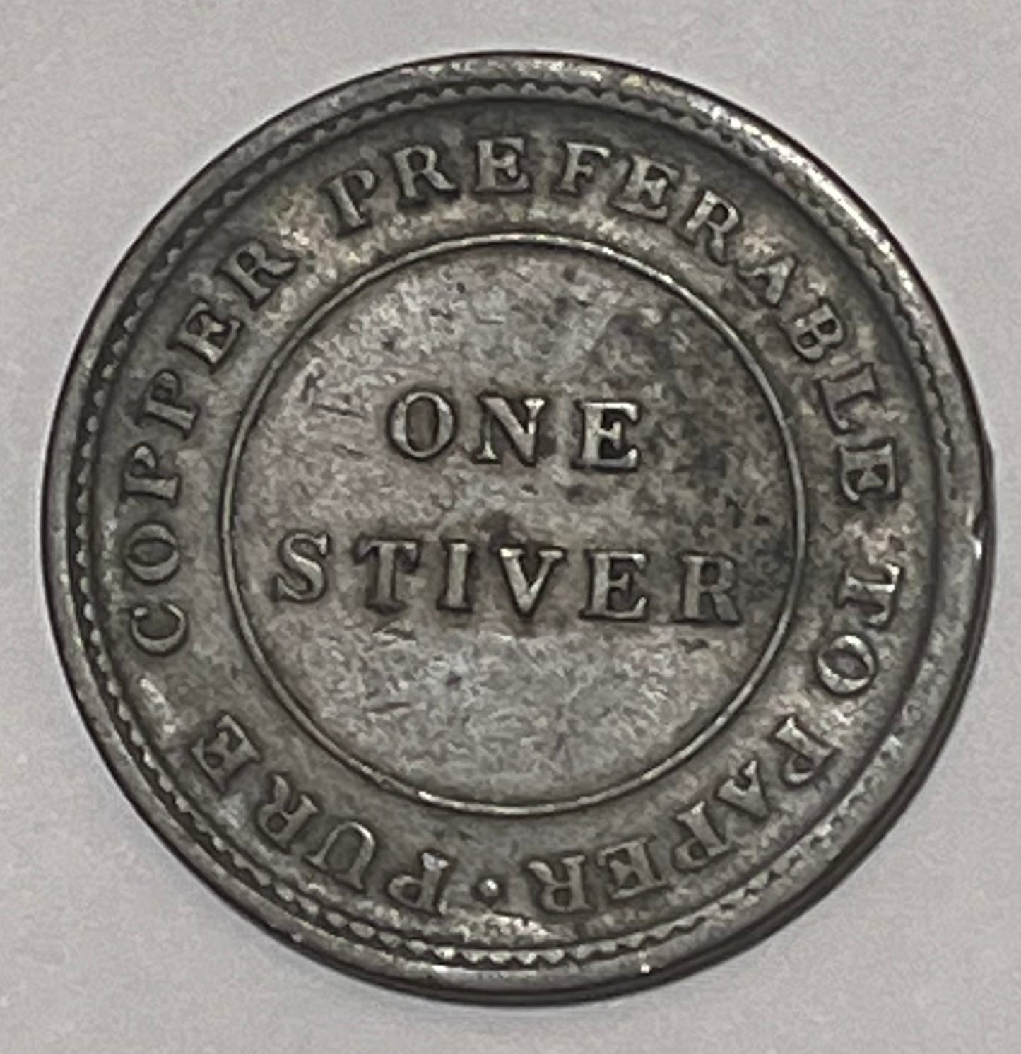 BRITISH GUIANA, Private Token Coinage ~ 1838 ~ Stiver ~ female seated on bale of hay left. Issued by Mr. Balgarmie a dry goods merchant ~ PURE COPPER PREFERABLE TO PAPER around 1 STIVER ~ KM-TN1, Pridore-60, Rulau ~ F-VF