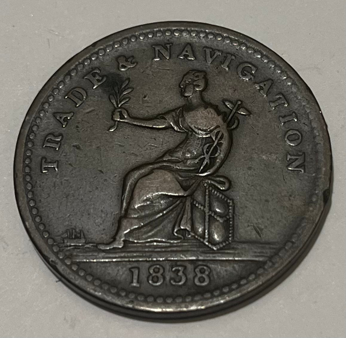 BRITISH GUIANA, Private Token Coinage ~ 1838 ~ Stiver ~ female seated on bale of hay left. Issued by Mr. Balgarmie a dry goods merchant ~ PURE COPPER PREFERABLE TO PAPER around 1 STIVER ~ KM-TN1, Pridore-60, Rulau ~ F-VF