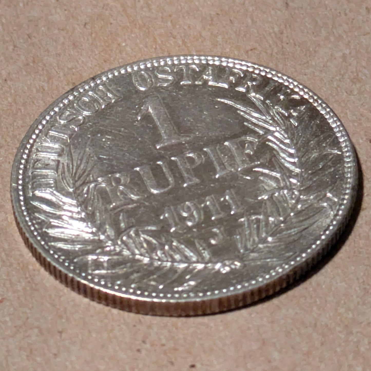 GERMAN EAST AFRICA, German East Africa Company ~ 1911-J ~ Rupie of Hamburg ~ Helmeted bust left ~ Demonimation, date and mintmark within wreath and legend ~ Y-15, KM-10 ~ Ch. AU, lightly brushed