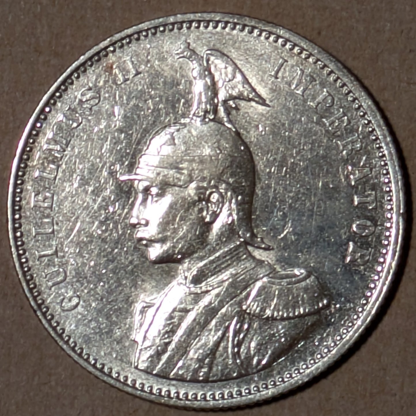 GERMAN EAST AFRICA, German East Africa Company ~ 1911-J ~ Rupie of Hamburg ~ Helmeted bust left ~ Demonimation, date and mintmark within wreath and legend ~ Y-15, KM-10 ~ Ch. AU, lightly brushed