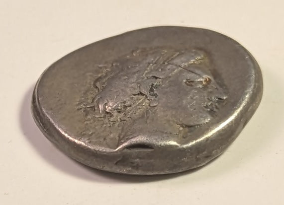 CAMPANIA, Neapolis ~ 325-241 BC ~ Silver Didrachm (7.41) ~ Head of nymph right. behind in Artemis-Hekate (head off-flan) ~ Man-headed bull right, being crowned by Nike, small monogram below ~ SG-308, SNG Cop-419 ~ Fine+, but a bit o.c., curved obv. s