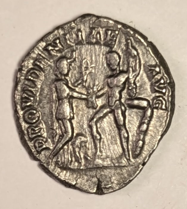 ROMAN EMPIRE, Commodus ~ 177-192 (192) ~ Silver Denarius (2.82g) ~ Laureate, draped bust right L AEL AVREL COMM AVG P FEL ~ Commodus, as Hercules, stg r.,resting club on tree trunk clasping hands with Africa ~ RIC-259a, SR-5687, C-643 ~ aEF