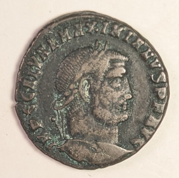 ROME, Galerius, as Augustus ~ 305-311 ~ Æ Follis of Heraclea ~ Laureate bust right ~ Genius, wearing modius, stg. l., holding patera and cornucopia, star in field, HTG in ex. ~ SR-14514 ~ aVF