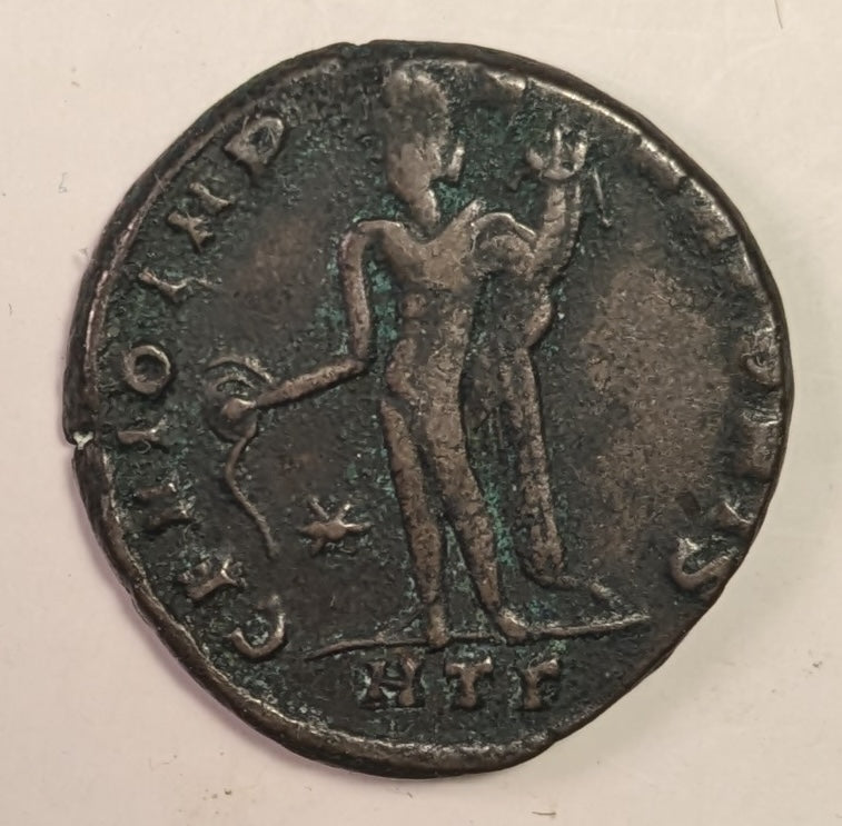 ROME, Galerius, as Augustus ~ 305-311 ~ Æ Follis of Heraclea ~ Laureate bust right ~ Genius, wearing modius, stg. l., holding patera and cornucopia, star in field, HTG in ex. ~ SR-14514 ~ aVF