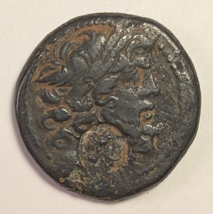 SYRIA, Seleucis & Pieria. Antioch ~ Pseudo-autonomous. 1st century BC ~ Æ Tetrachalkon (23.5mm, 11.07g) ~ Laureate head of Zeus right ~ c/m: head of Cleopatra VII(?) right within oval incuse ~ Zeus Nikephoros seated left ~  VF/aF