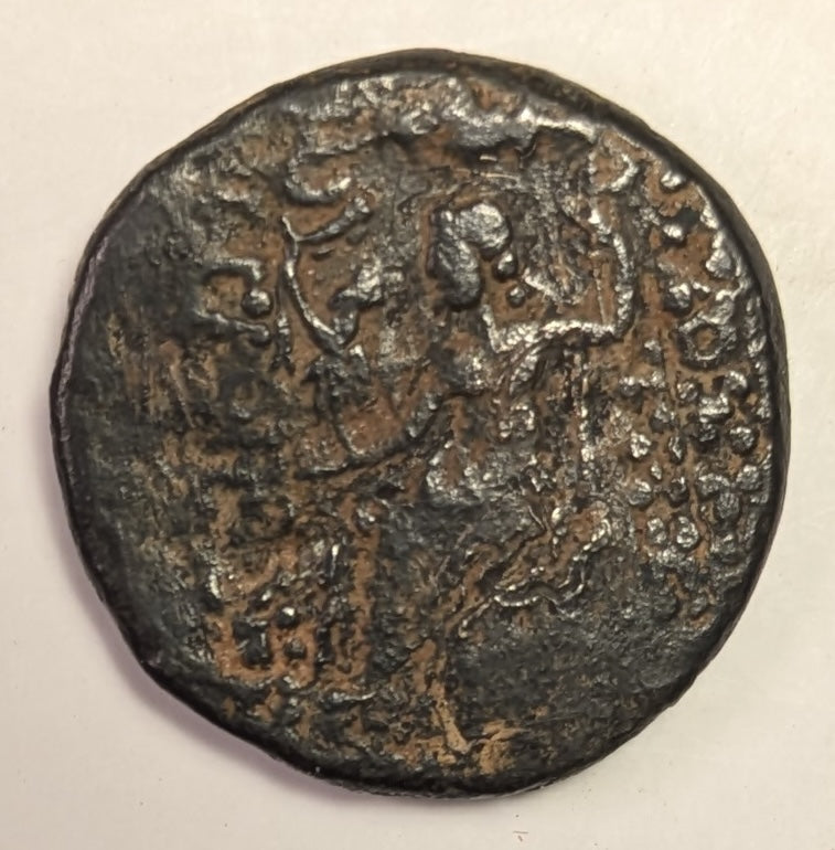 SYRIA, Seleucis & Pieria. Antioch ~ Pseudo-autonomous. 1st century BC ~ Æ Tetrachalkon (23.5mm, 11.07g) ~ Laureate head of Zeus right ~ c/m: head of Cleopatra VII(?) right within oval incuse ~ Zeus Nikephoros seated left ~  VF/aF