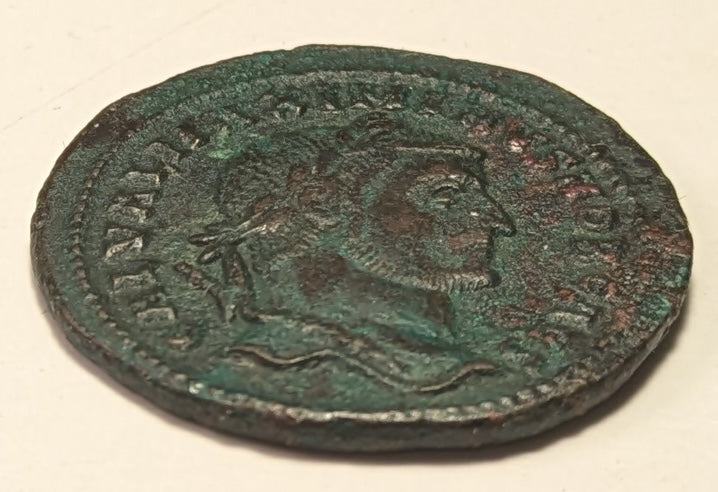 ROME, Maximinus II ~ 309-313 AD (Early 307) ~ Æ Follis (8.96g) Cyzicus ~ Laureate bust right ~ GENIO AVGG ET CAESARVM  NN Genius pouring libation from patera, KΓ in ex, star in r. field ~ RIC-VI, 26a, SR-14716 ~ VF, brown-green patina