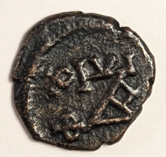 BYZANTINE, Justin II ~ 565-578 ~ Æ Pentanummium (1.57g) ~ Monogram #8 (See Sear Byzantine coins page 32) ~ Large E, K to right. Cyzicus mint ~ SB-375, Berk-325 ~ Nice VF