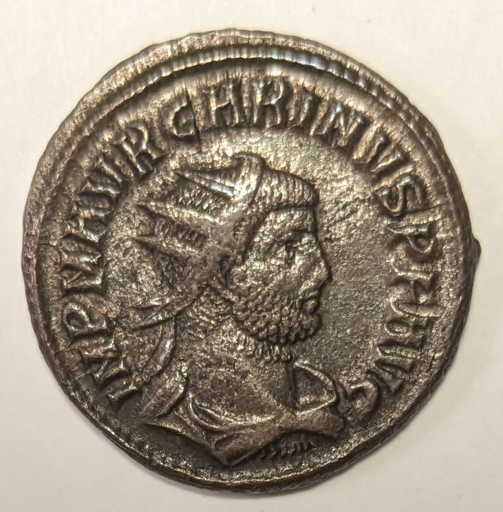 ROME, Carinus, as Augustus  ~ 283-285 AD (284) ~ Silvered Antoninianus (4.14g, 21 mm) ~ Radiate bust right IMP M AVR CARINVS PF AVG. Cyzicus mint ~ Carinus receiving Victory from Jupiter CLEMENTIA TEMP, Γ twixt, XXI in ex ~ SR-12342, RIC-324 ~ GVF