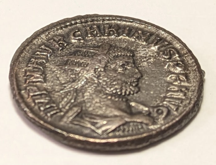 ROME, Carinus, as Augustus  ~ 283-285 AD (284) ~ Silvered Antoninianus (4.14g, 21 mm) ~ Radiate bust right IMP M AVR CARINVS PF AVG. Cyzicus mint ~ Carinus receiving Victory from Jupiter CLEMENTIA TEMP, Γ twixt, XXI in ex ~ SR-12342, RIC-324 ~ GVF